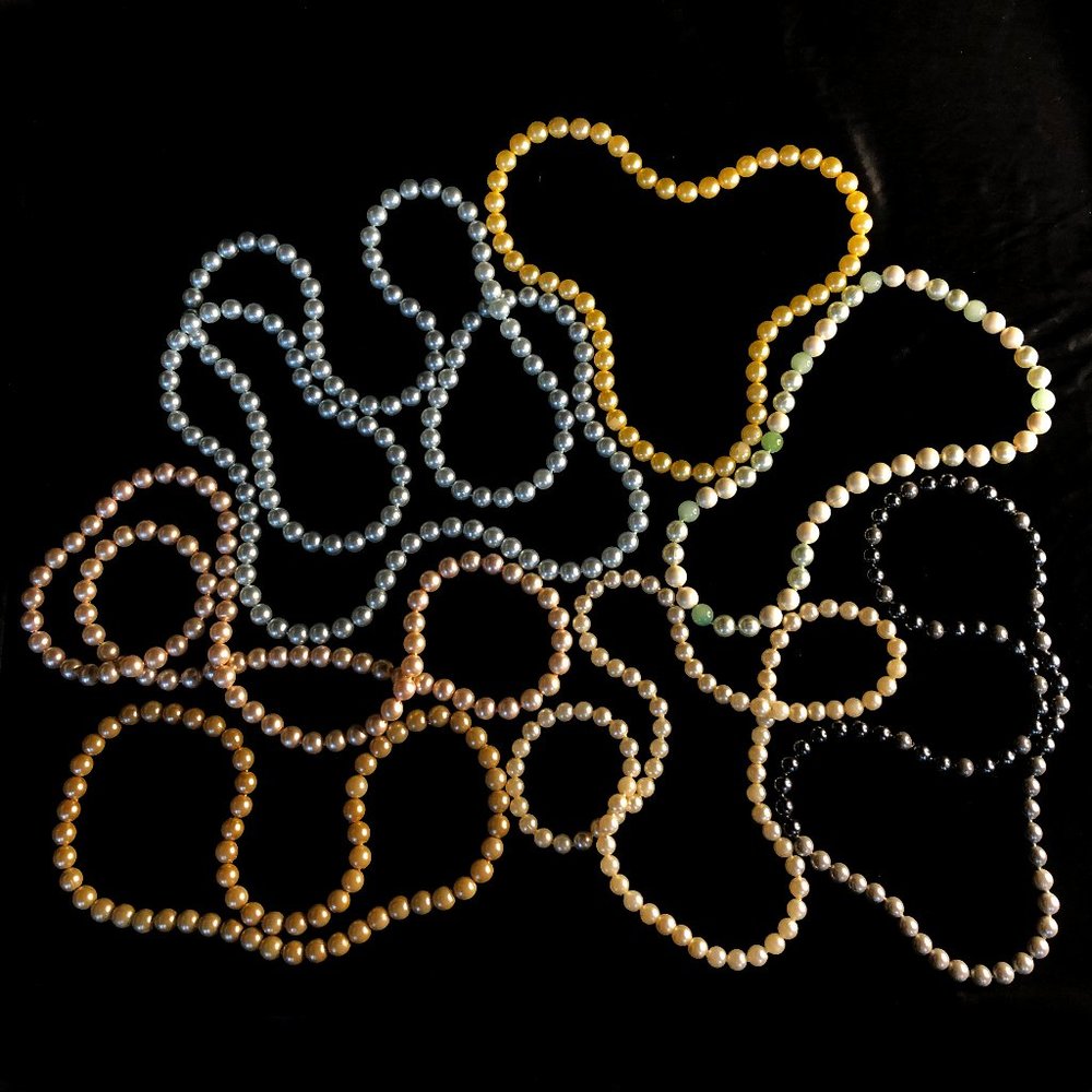Seven strands of vintage 1950’s pop-it beads